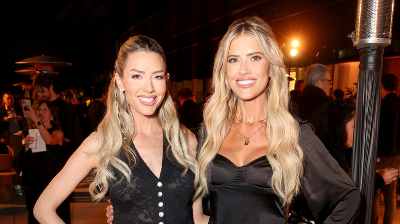 Heather Rae El Moussa and Christina Haack at an event