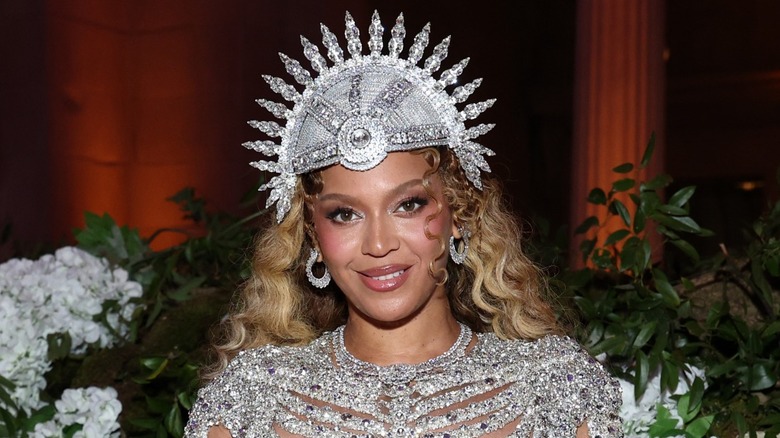 Beyoncé smiling in silver crown