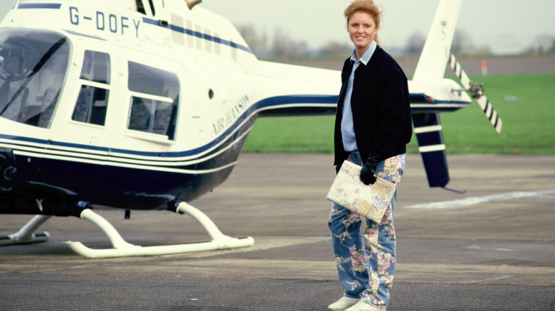 Sarah Ferguson standing outside a helicopter