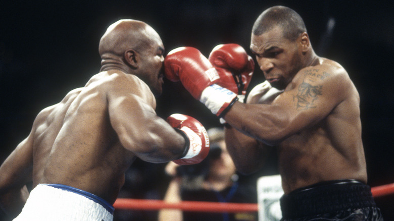 Evander Holyfield and Mike Tyson boxing
