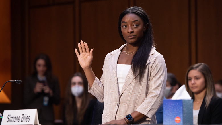 Simone Biles testifying in front of Congress