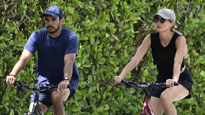 Gisele Bündchen and Joaquim Valente biking