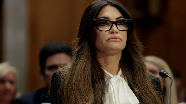 Kimberly Guilfoyle looking serious during her confirmation hearing