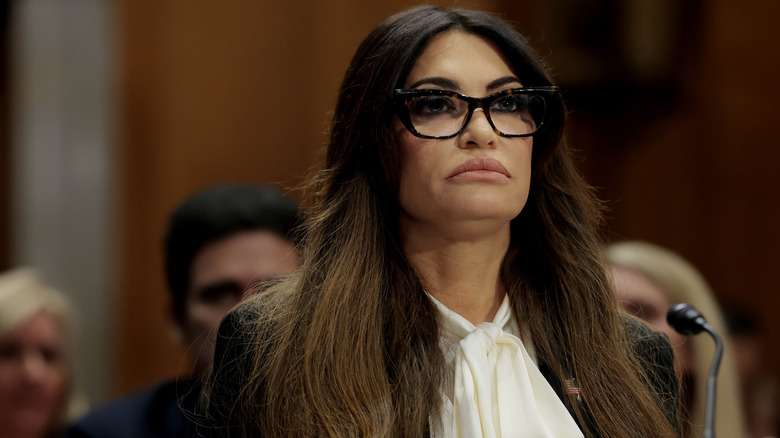 Kimberly Guilfoyle looking serious during her confirmation hearing