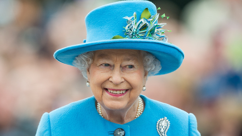Queen Elizabeth smiles for a photo.