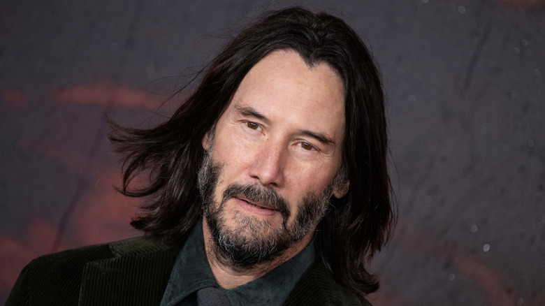 Keanu Reeves arriving at an event