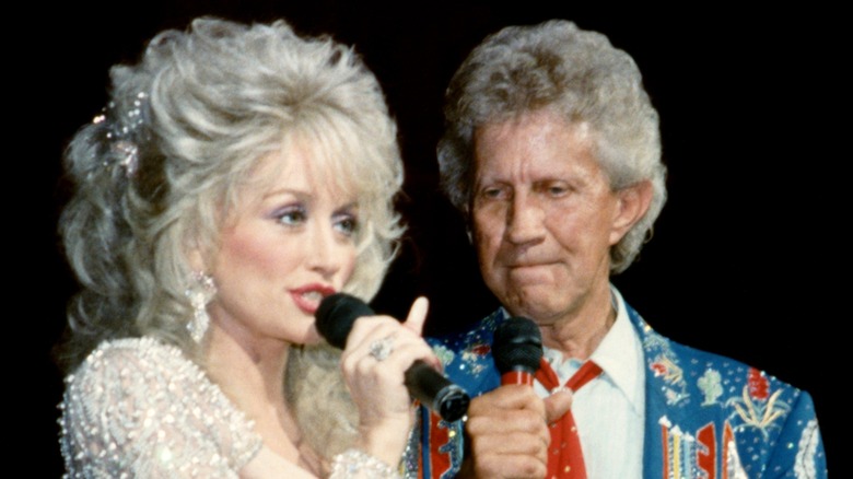 Dolly Parton and Porter Wagoner together in the '90s at the Grand Ole Opry