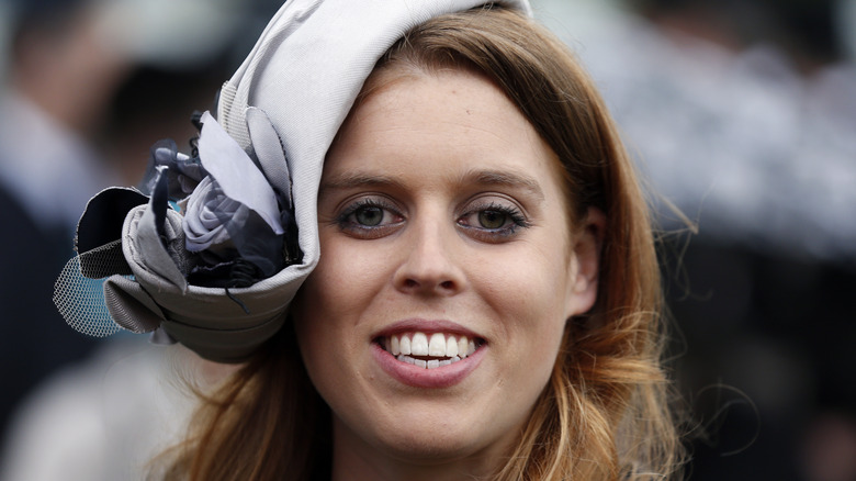 Princess Beatrice wearing white headpiece