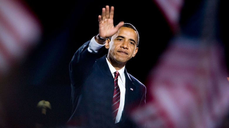 Barack Obama waving on stage