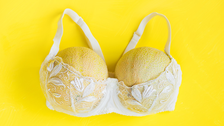 Two melons inside bra