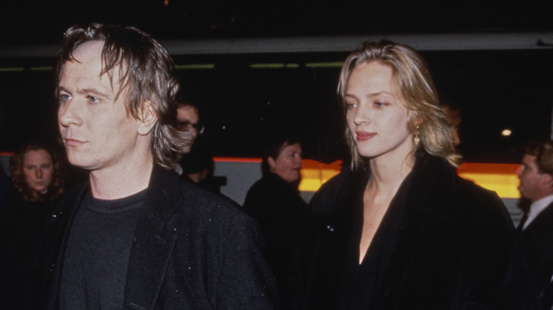 Young Uma Thurman walking with Gary Oldman in 1992