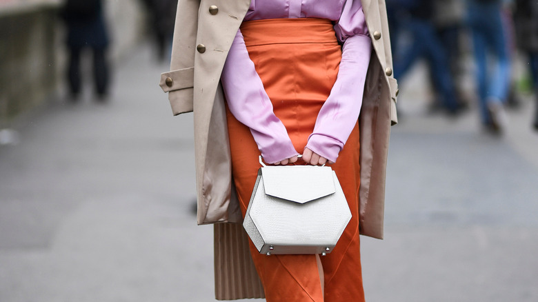 Outfit featuring orange leather skirt