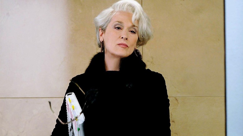 Meryl Streep as Miranda Priestly getting out of the elevator with a fur coat on in "The Devil Wears Prada."