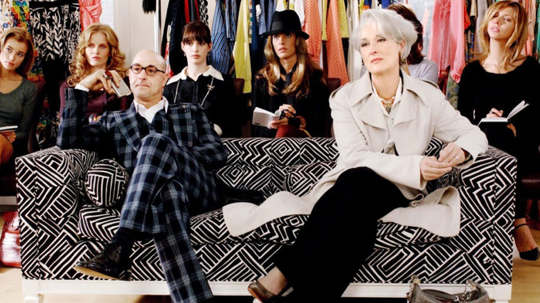 Stanley Tucci and Meryl Streep sitting on a couch as their characters in "The Devil Wears Prada"