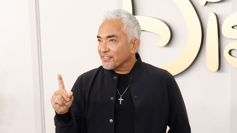 Cesar Millan pointing his index finger
