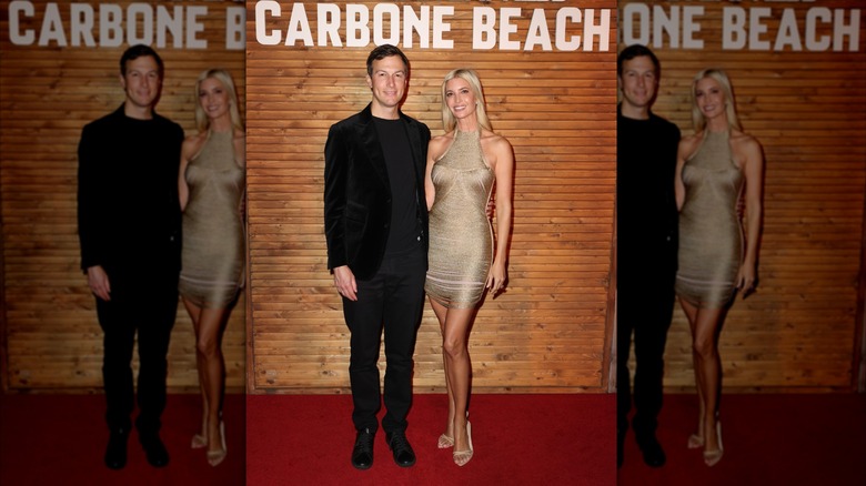 Jared Kushner and Ivanka Trump posing at a Carbone Beach event in Miami, 2025.