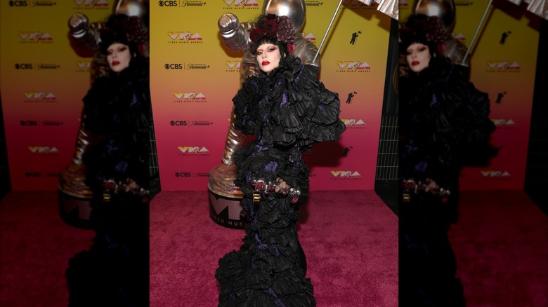 Lady Gaga posing at the VMAs in 2025