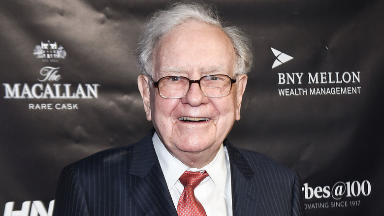 Warren Buffett smiling at a 2017 Forbes Media event