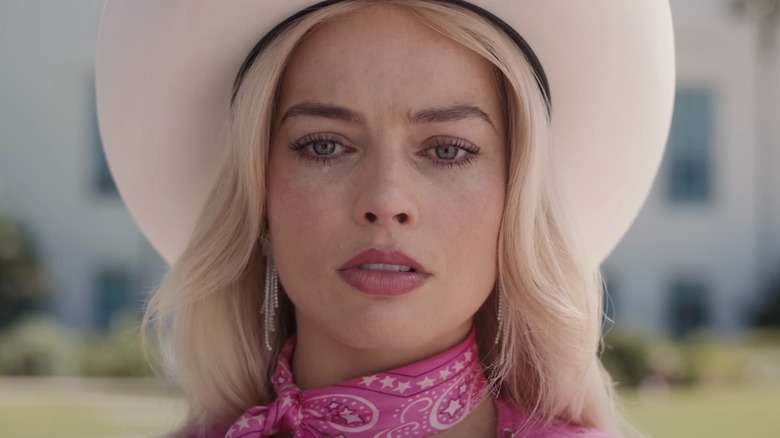 Margot Robbie as Barbie crying