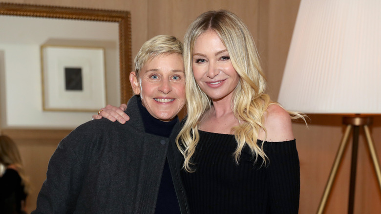 Ellen DeGeneres and Portia de Rossi in black