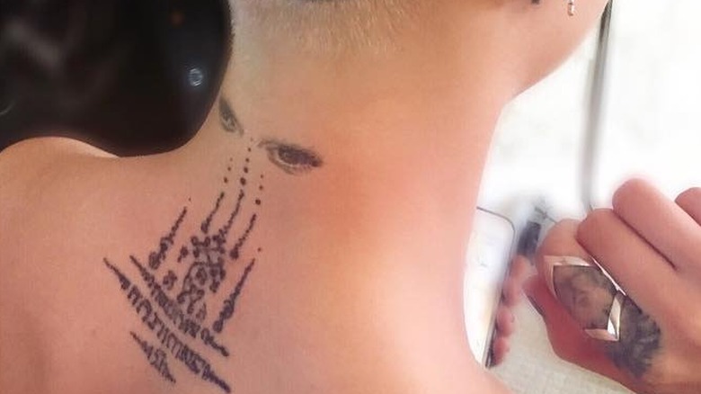 Cara Delevingne's neck tattoo