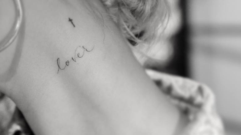 Hailey Baldwin's "Lover" neck tattoo