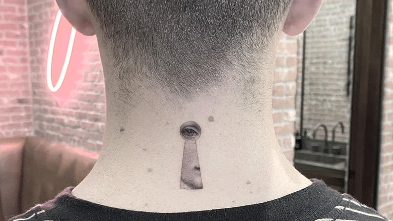Joe Jonas' neck tattoo of an eye in a keyhole