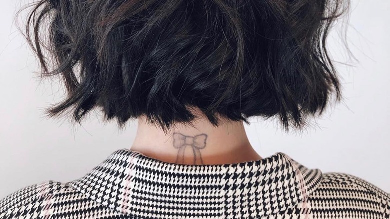 Lucy Hale's tattoo of a bow