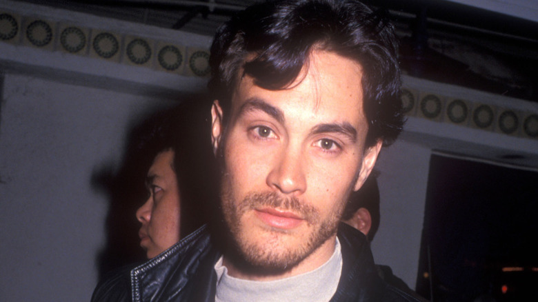 Brandon Lee posing at an event