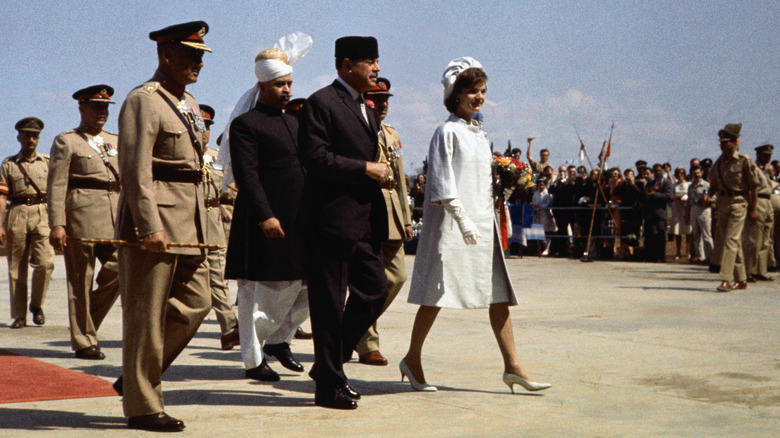 Jacqueline Kennedy walking with Pakistani officials