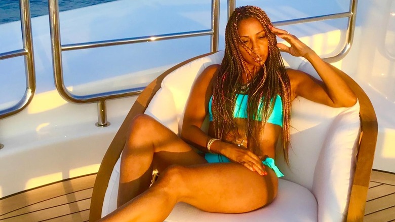 Holly Robinson-Peete relaxing on a boat