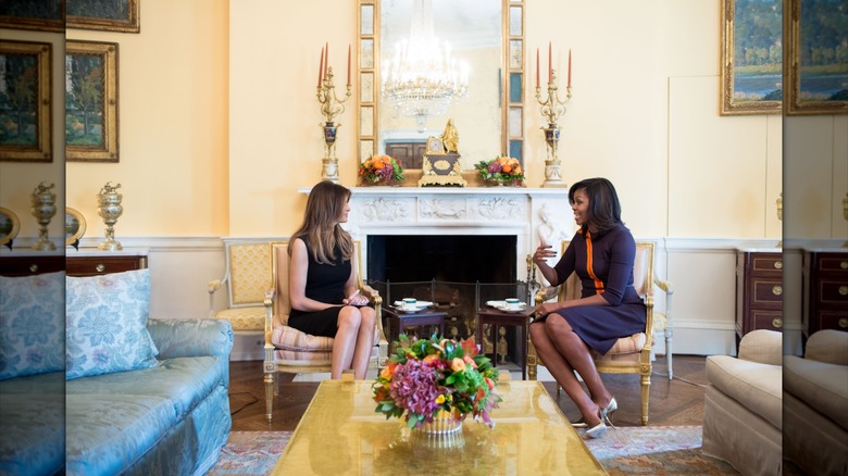 Melania Trump and Michelle Obama talking at the White House