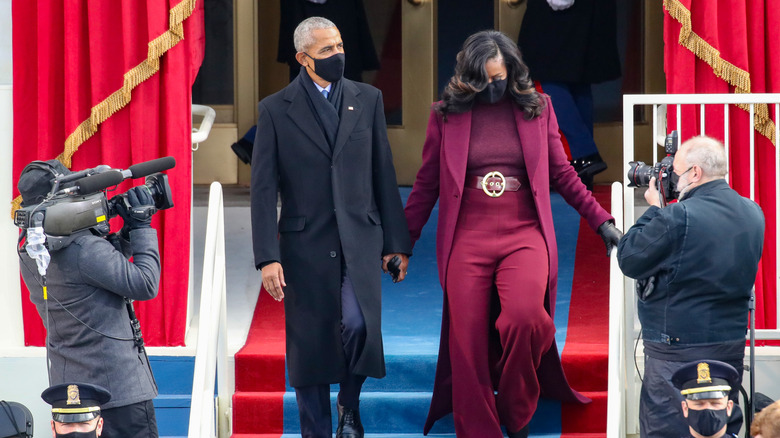 Barack and Michelle Obama walking together at Joe Biden's inauguration