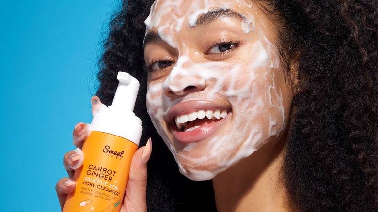 Black model washing face
