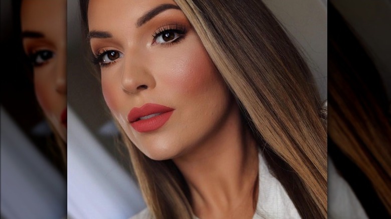 woman with blush and lipstick
