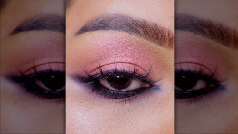 eye with heavy makeup