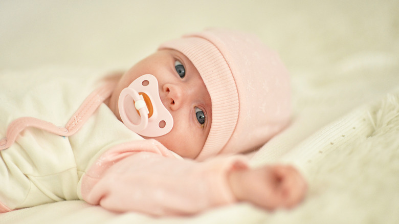 Baby with pacifier
