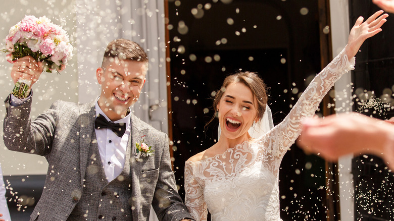 Bride and groom smiling 