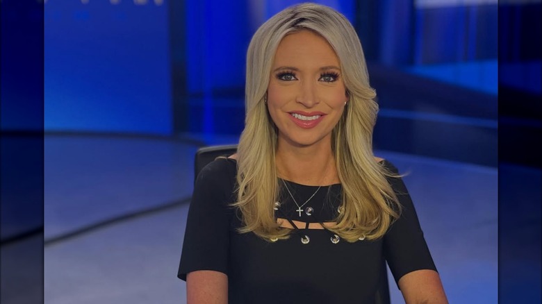 Kayleigh McEnany wearing a black dress with lace-up grommet detail
