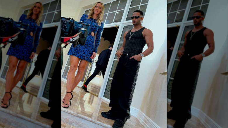 Lara Trump wearing a blue snakeskin print dress and filming a music video with  Mohamed Ramadan