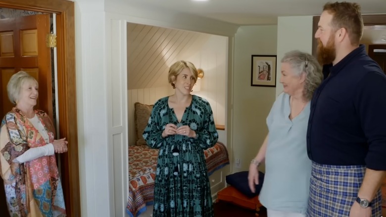 Erin Napier on an episode of Home Town in a green dress