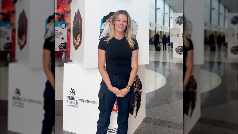 Sherry Holmes in cargo pants and a black top at an event on Instagram