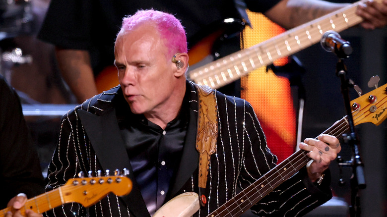 Flea performing on stage