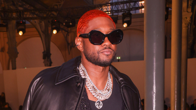 Usher attending Paris Fashion Week