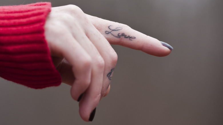 Hand with tattoos