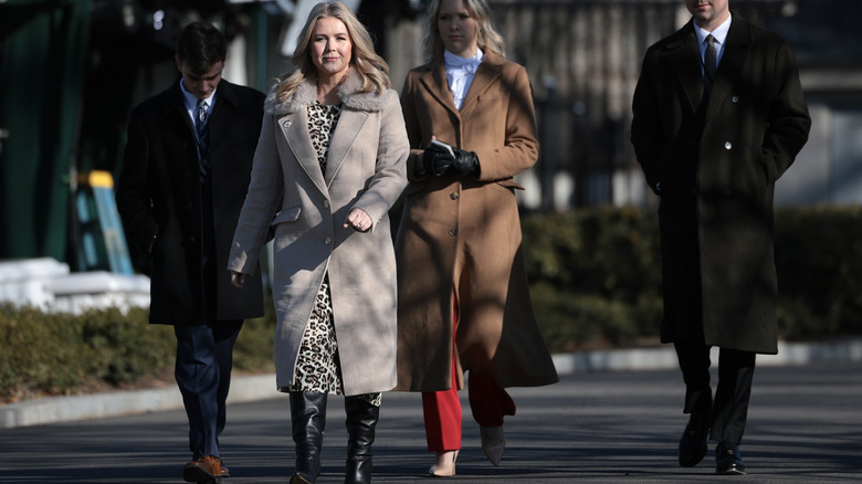 Karoline Leavitt walking outside the White House