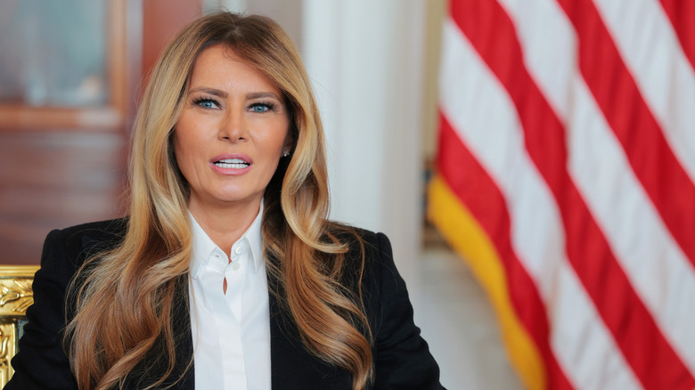 First lady Melania Trump speaks during a meeting with Keith Siegel and Aviva Siegel