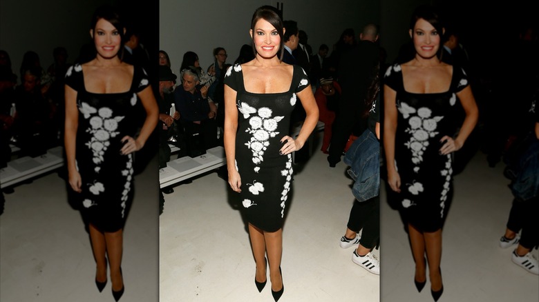Kimberly Guilfoyle wearing a black, floral dress at New York Fashion Week
