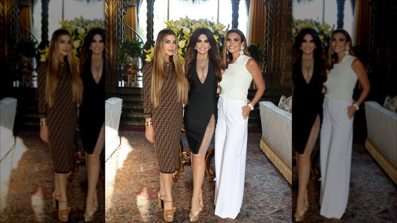 Kimberly Guilfoyle posing for photo in black dress