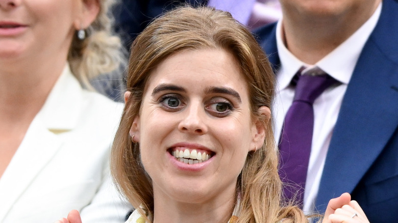 Princess Beatrice smiling in audience